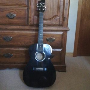 Guitar, books and strings. See pictures.